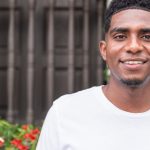 Portrait of an African-American man looking at the camera.